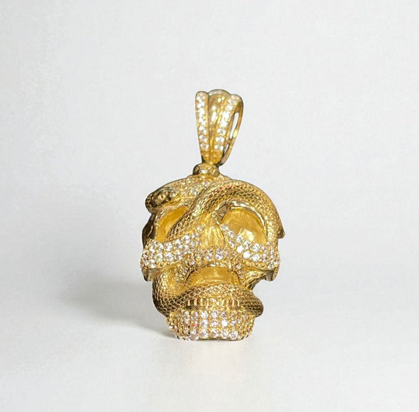 Skull with snake pendant