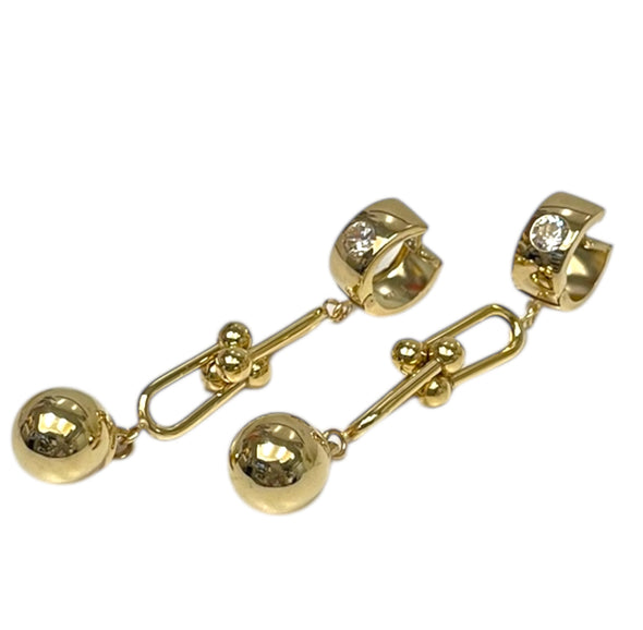 Dangling balls earrings