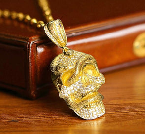 Skull with snake pendant