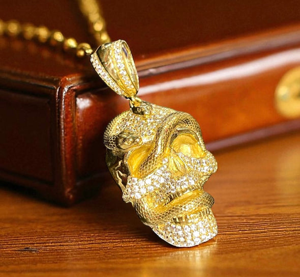 Skull with snake pendant