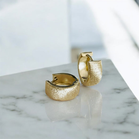 Gold huggie earrings